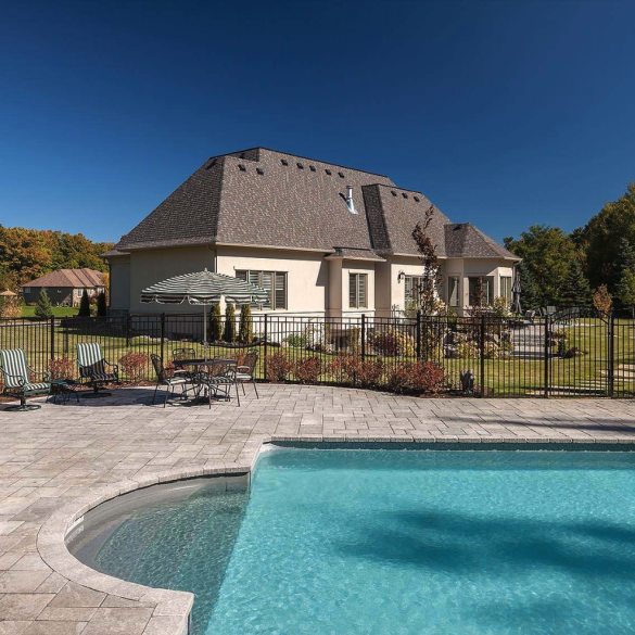 Custom home in a rural area with swimming pool.